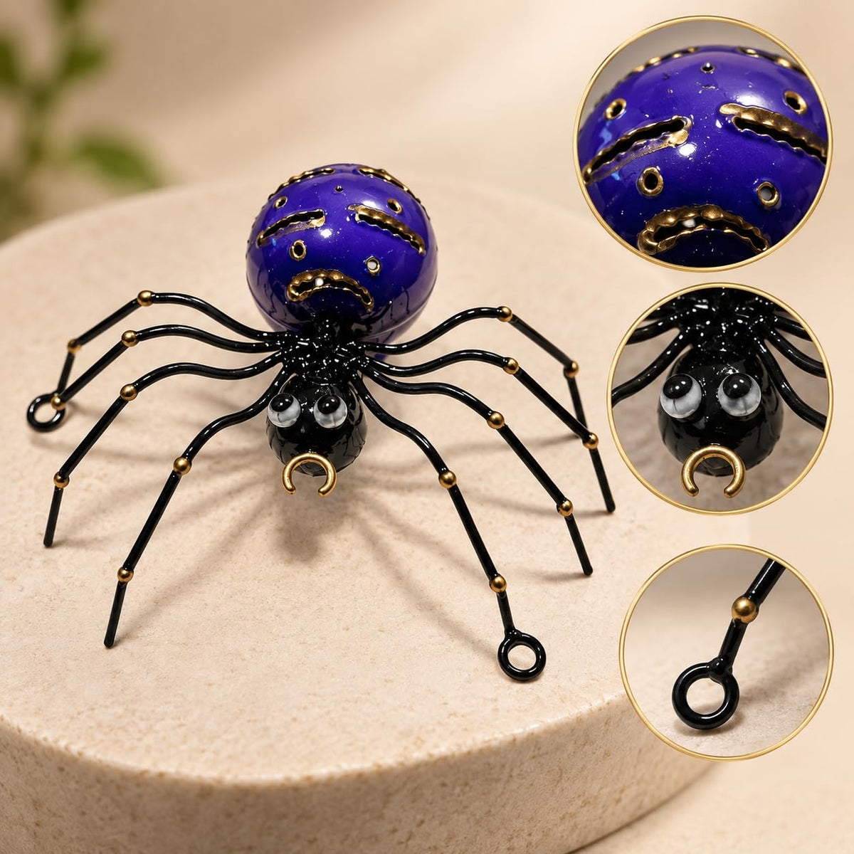 Detailansicht: Violette dekorative Metallspinne mit schwarzen Beinen und goldfarbenen Details